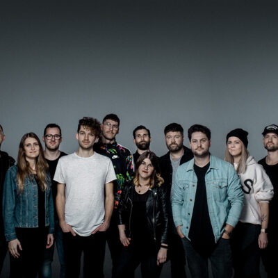 alt="Outbreakband_Patenschaftskampagne_2022_Compassion_Deutschland"